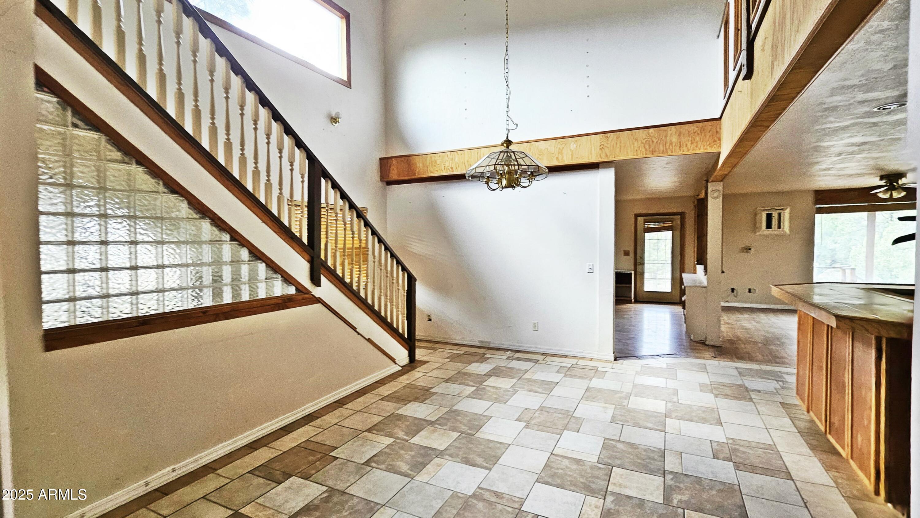 616 Verde Place Payson, AZ 85541 - Photo 20 of 29 a view of a hallway with wooden floor and staircase
