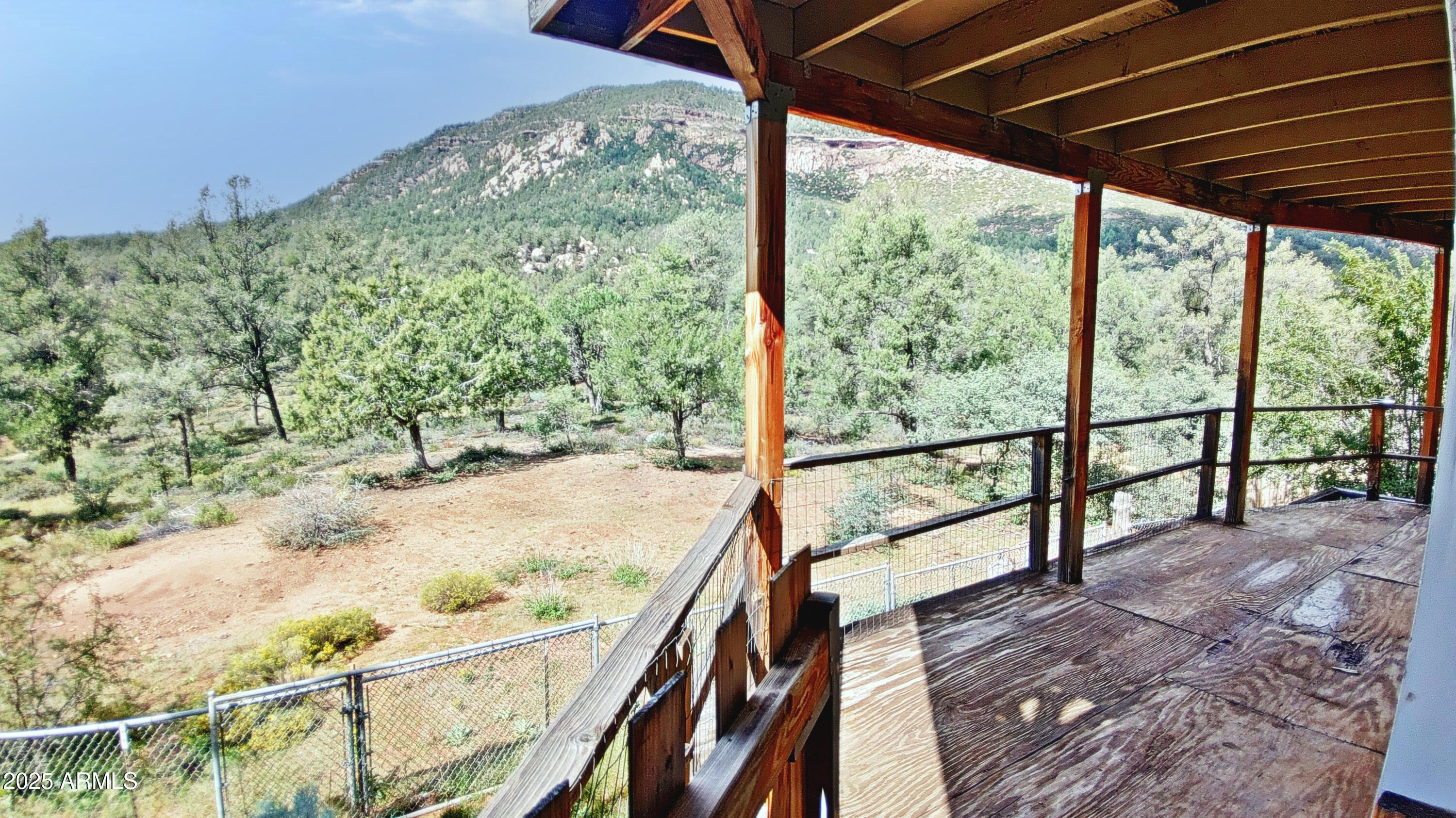 616 Verde Place Payson, AZ 85541 - Photo 5 of 29 a view of balcony with wooden floor and fence