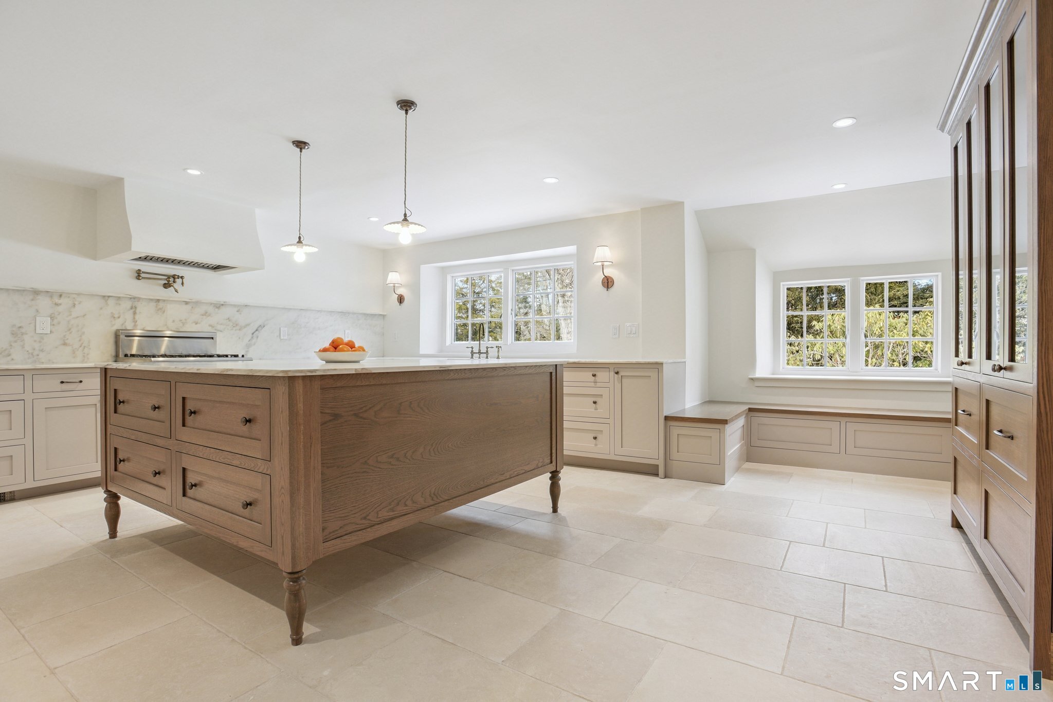 1085 Ridge Road Hamden, CT 06517 - Photo 15 of 41 A built-in banquette will be a cozy place to eat in the kitchen. There is also a built-in hutch.