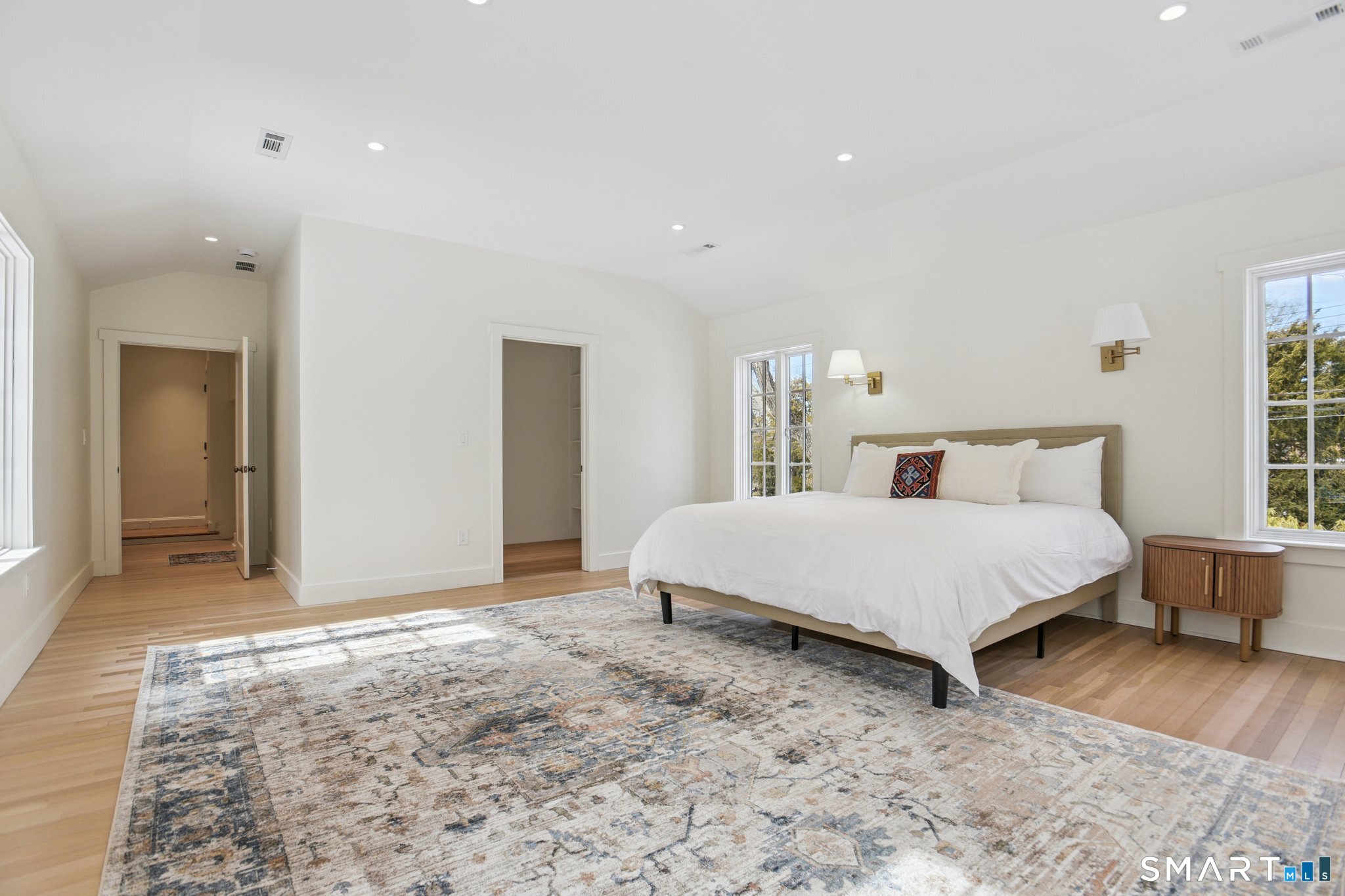 1085 Ridge Road Hamden, CT 06517 - Photo 20 of 41 Extraordinary primary suite offers a walk-in closet and magnificent light