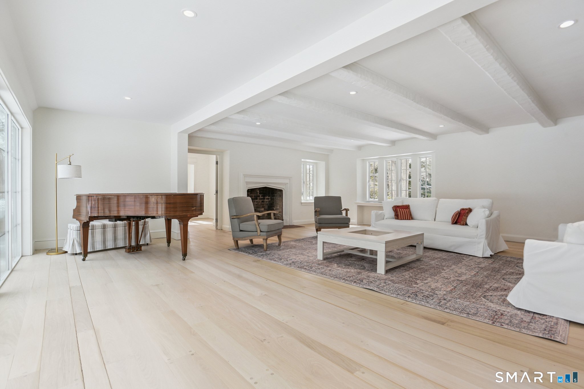 1085 Ridge Road Hamden, CT 06517 - Photo 2 of 41 The large open, spacious feeling living room has a beamed ceiling