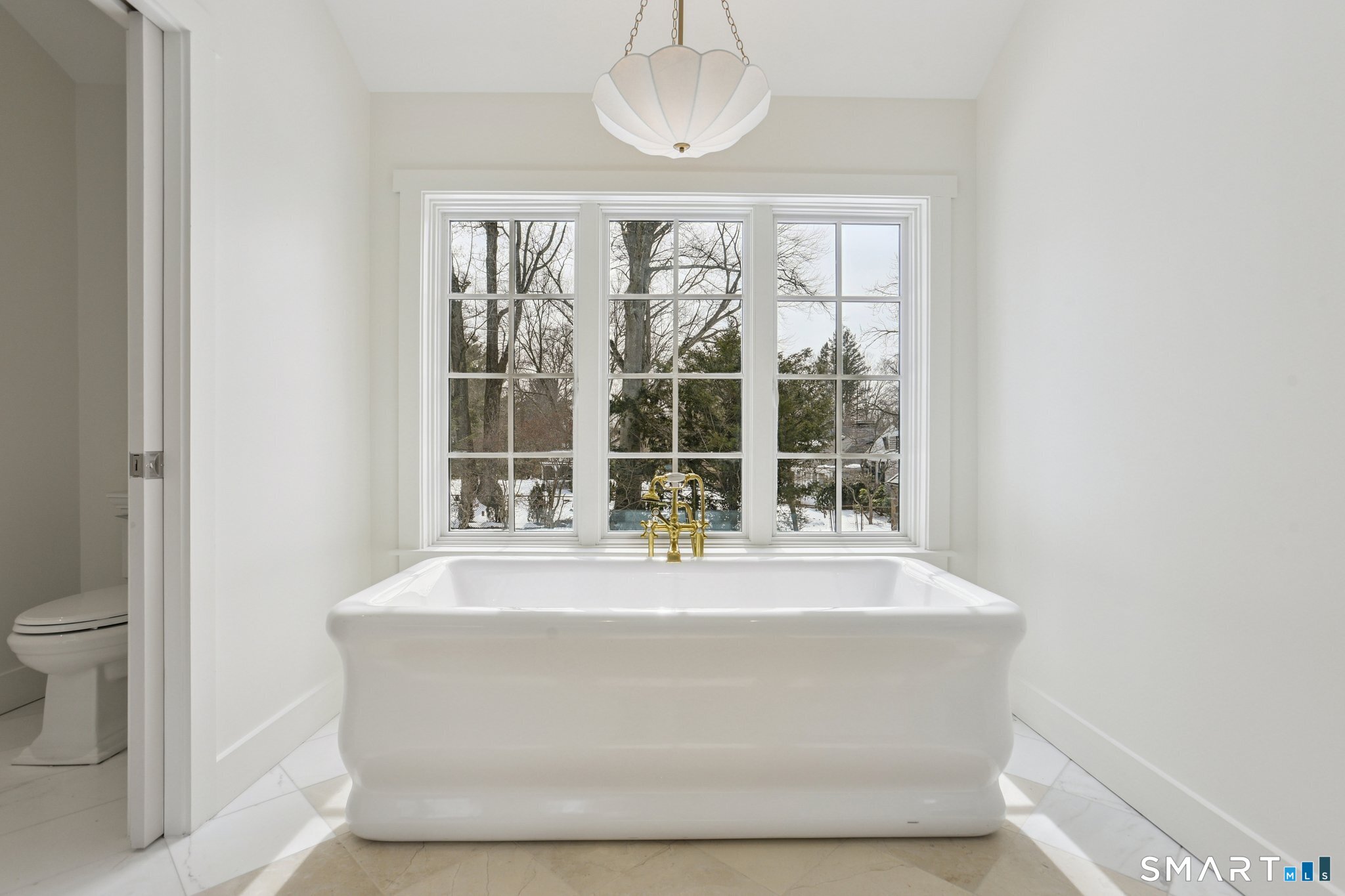 1085 Ridge Road Hamden, CT 06517 - Photo 24 of 41 The large freestanding soaking tub overlooks the garden