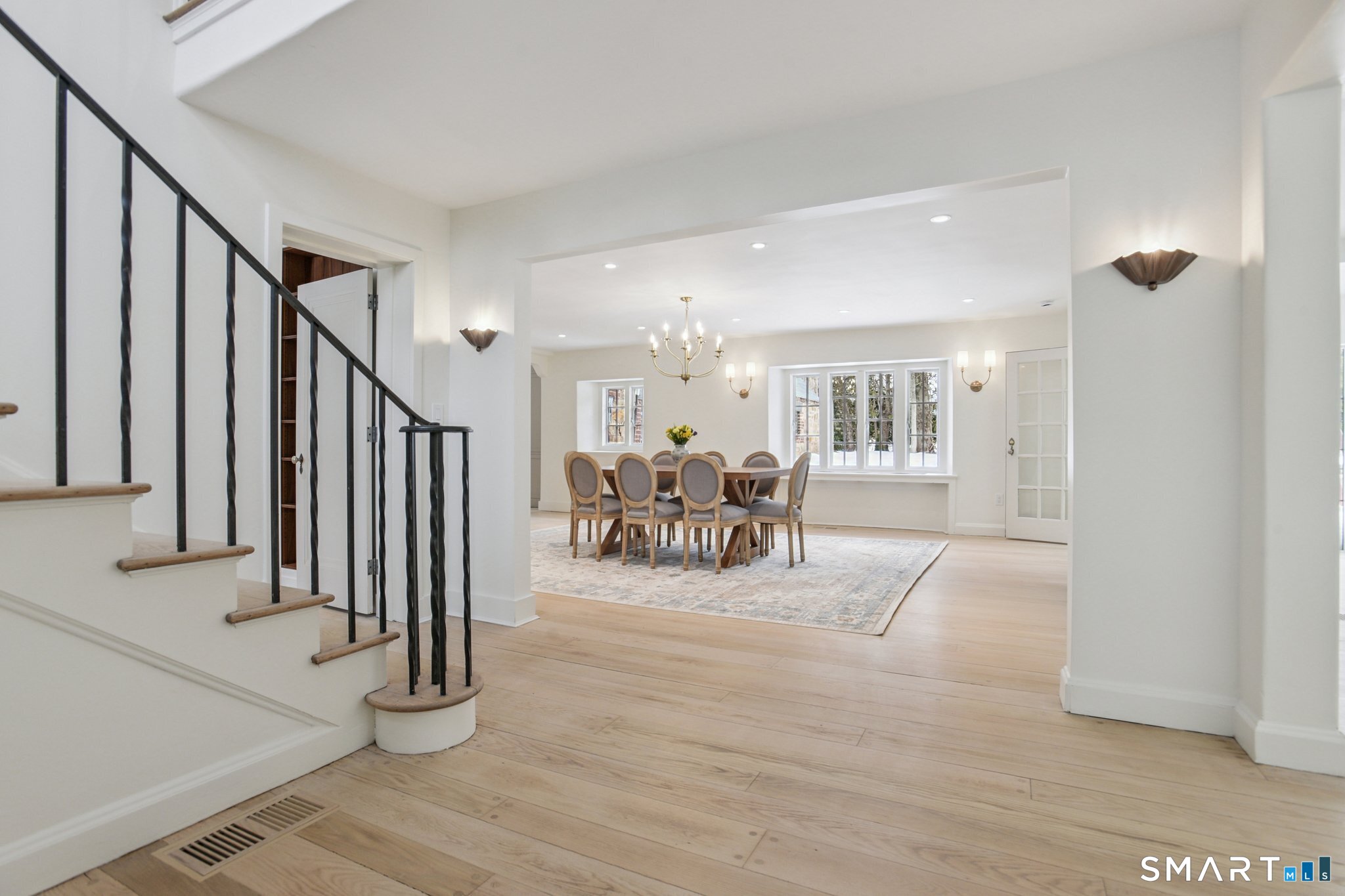 1085 Ridge Road Hamden, CT 06517 - Photo 8 of 41 The gracious entry hall has large openings to the dining room and living room
