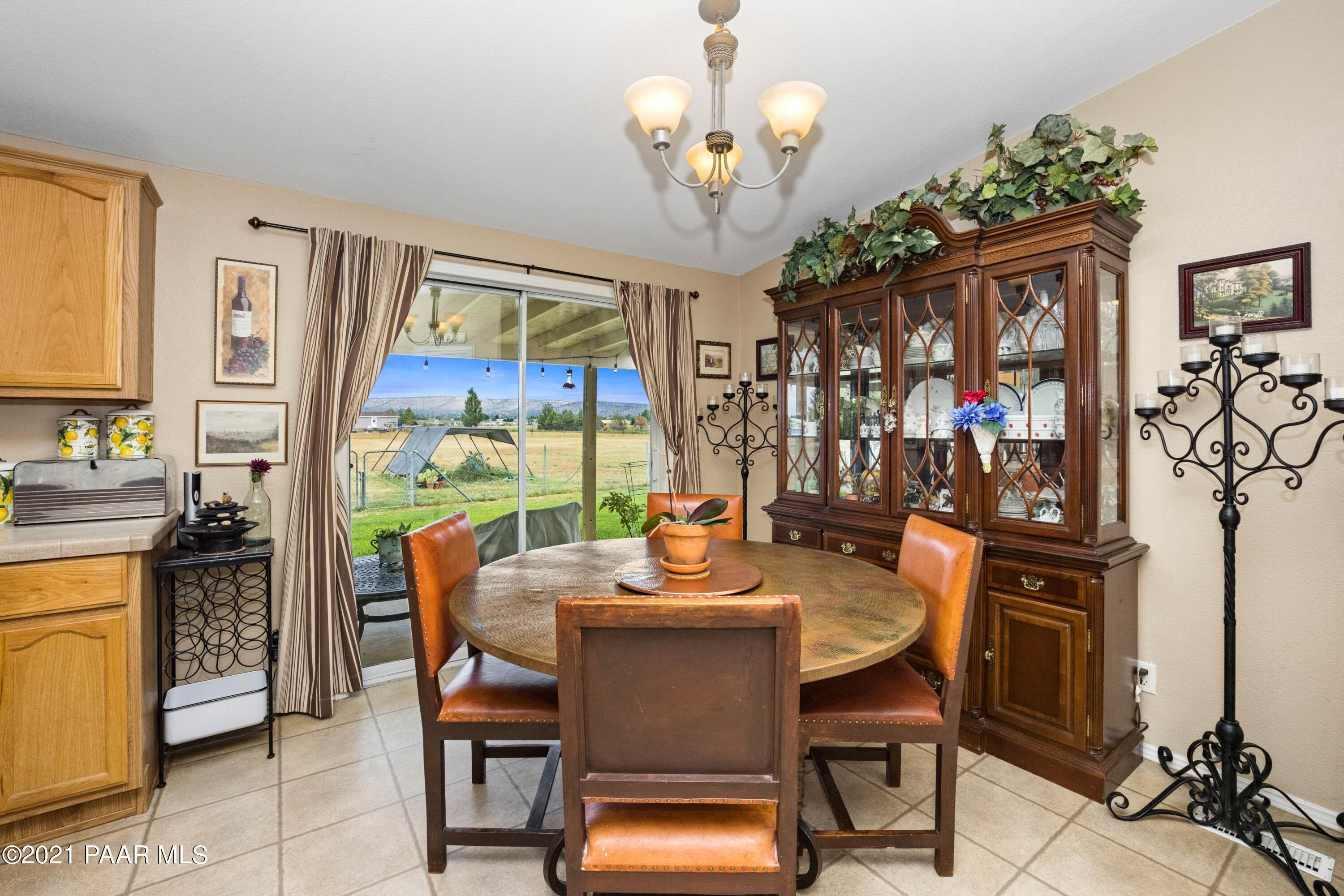 1102 Saddle Road Paulden, AZ 86334 - Photo 13 of 35 a view of a dining room with furniture window and outside view