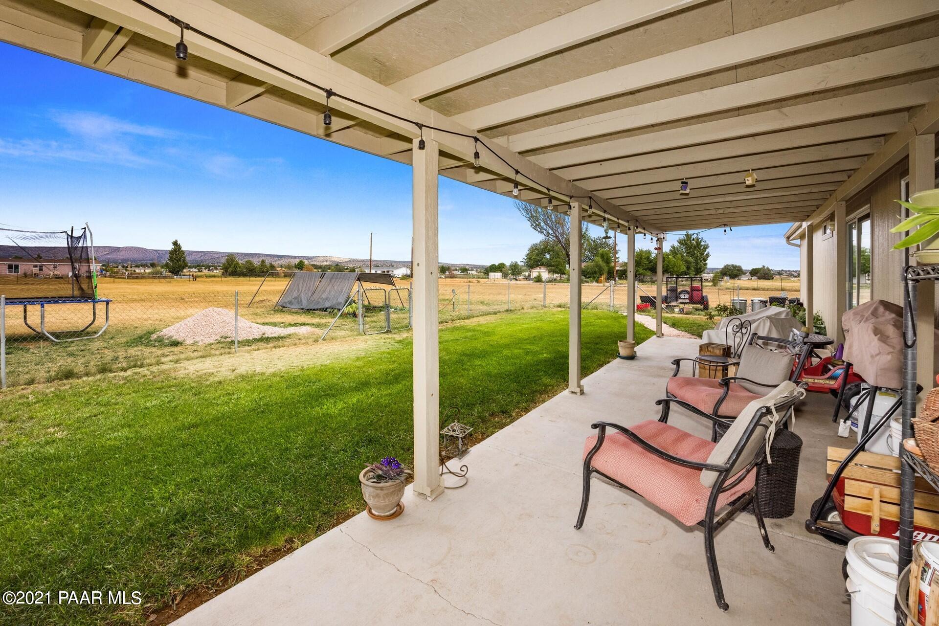 1102 Saddle Road Paulden, AZ 86334 - Photo 21 of 35 a view of a swimming pool with a patio