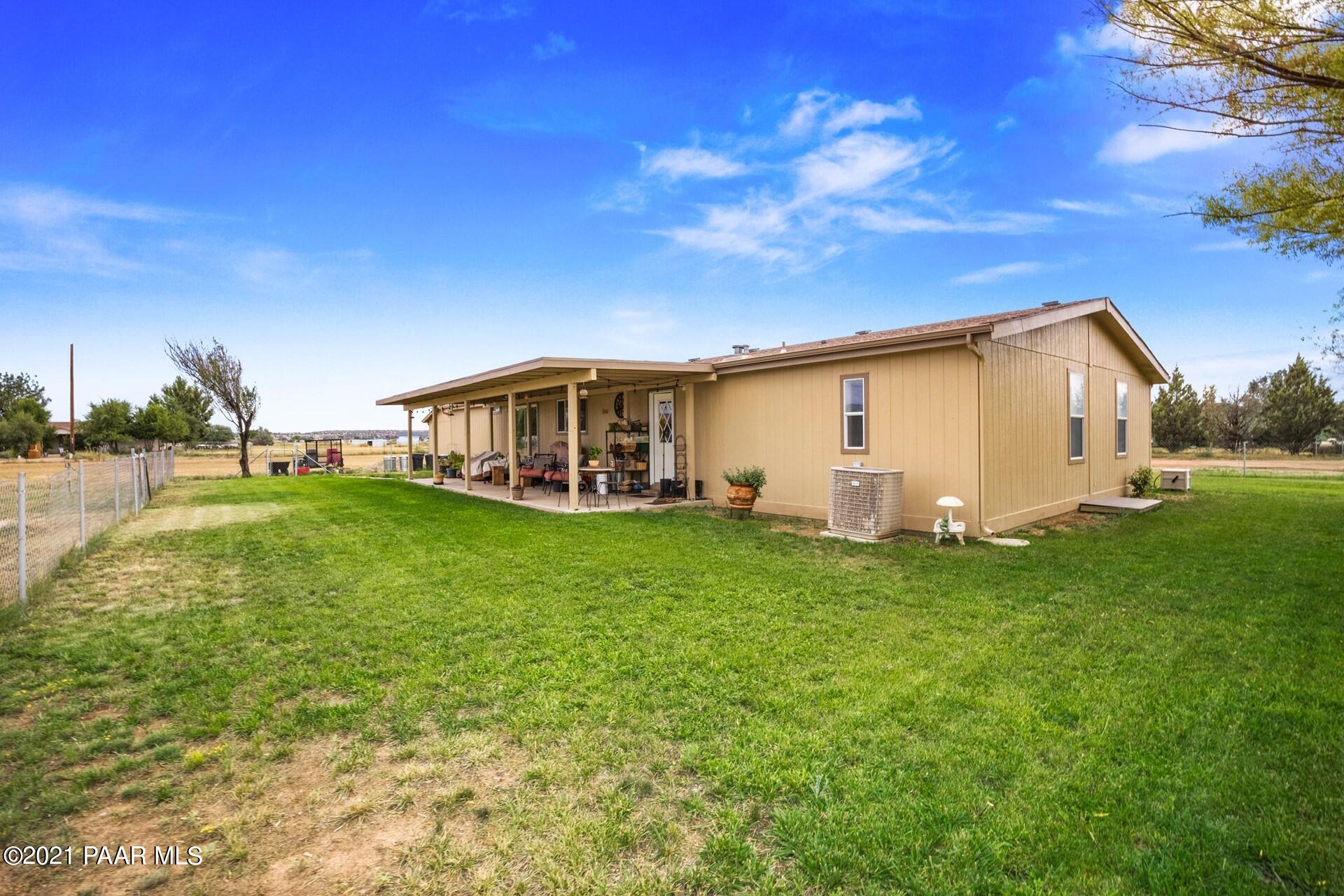 1102 Saddle Road Paulden, AZ 86334 - Photo 23 of 35 a view of a house with a backyard