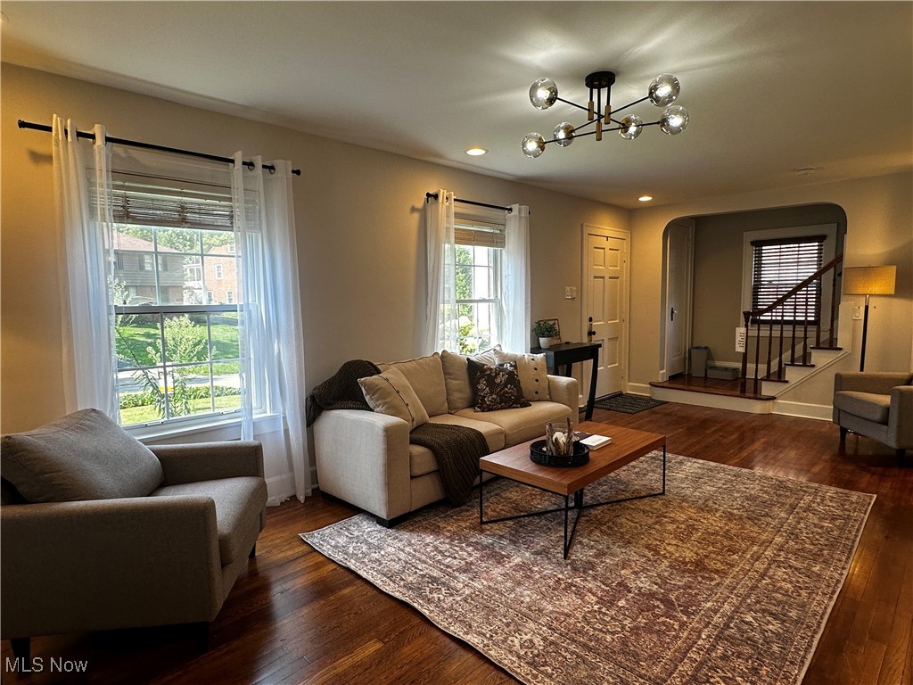 2255 Edgerton Road University Heights, OH 44118 - Photo 7 of 33 Living room with plenty of natural light, a notable chandelier, and dark hardwood / wood-style flooring