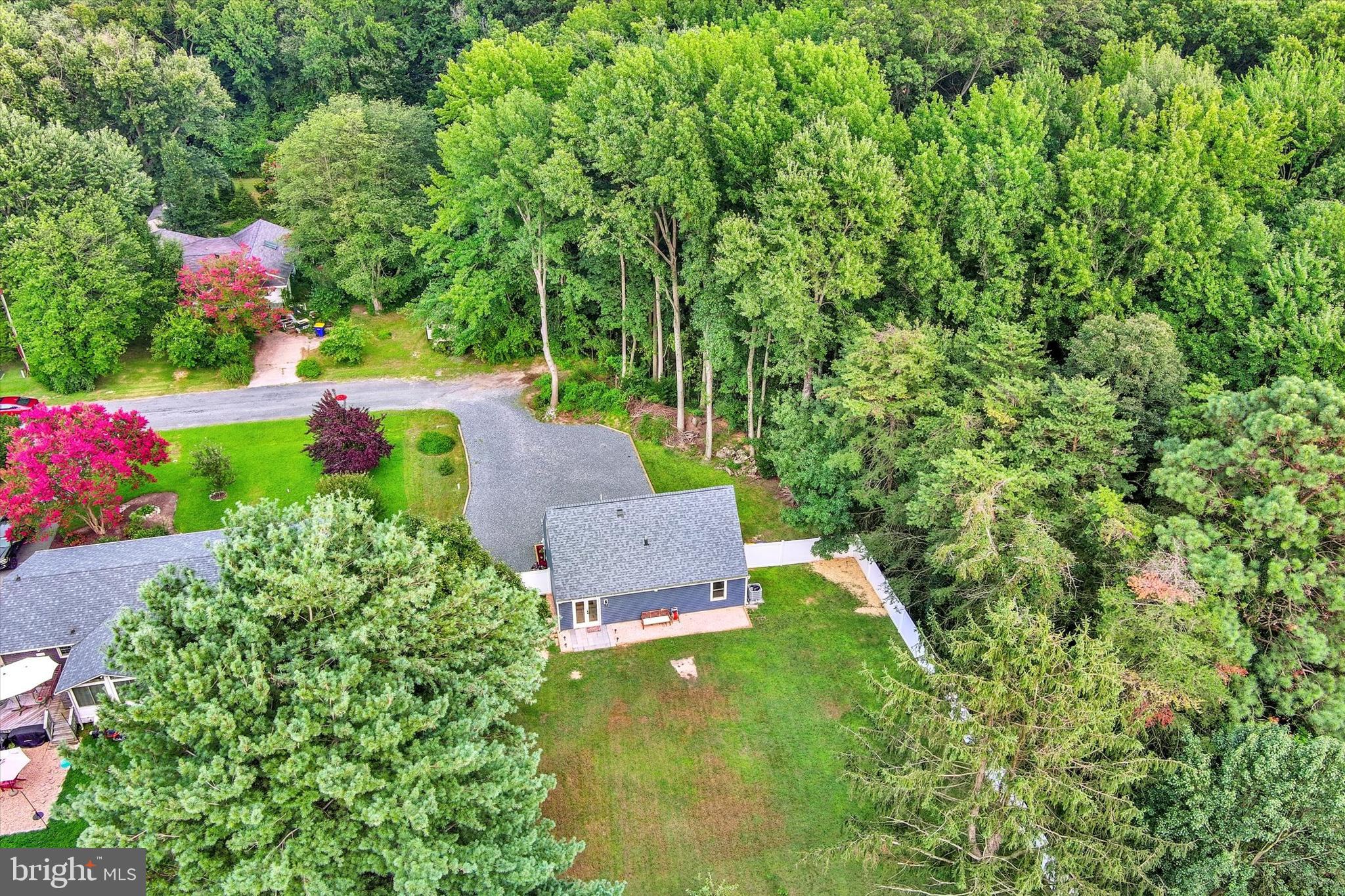 102 Maple Road Stevensville, MD 21666 - Photo 34 of 43 an aerial view of a house with a yard