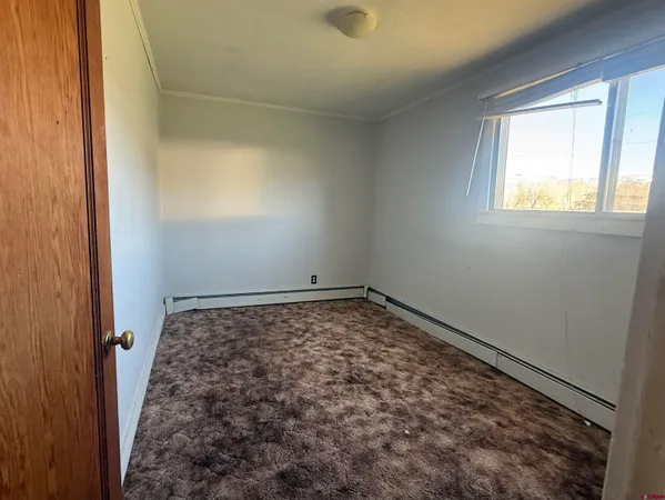 $410,000 | 319 East 1st Street, Mancos, CO 81328