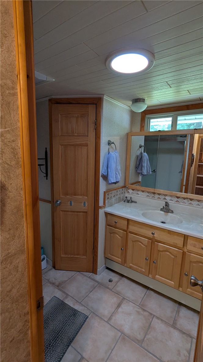 683 Lower 3rd Brook Road Walton, NY 13856 - Photo 17 of 27 Full bath with large vanity, linen closet.