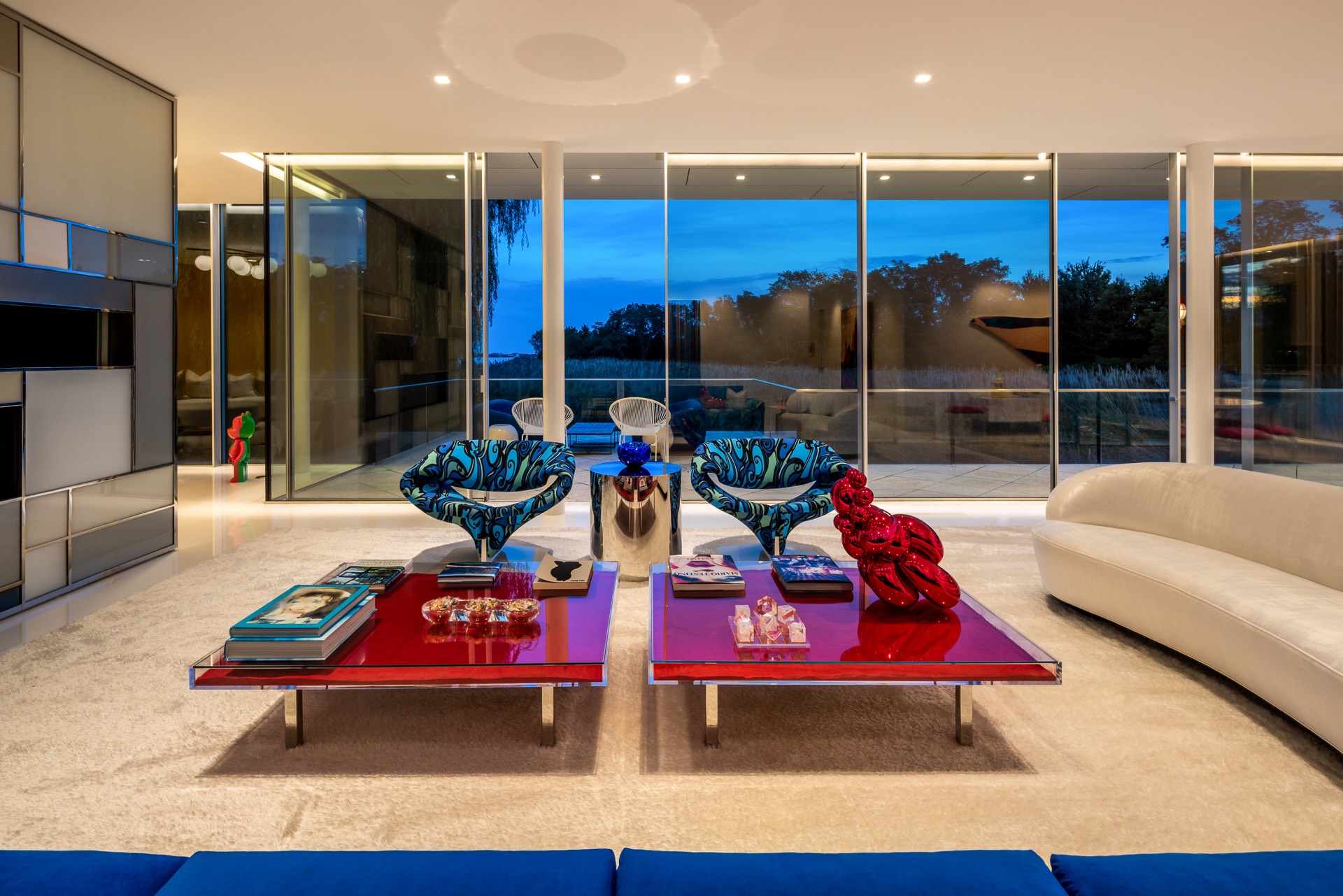 34 Cobb Isle Road Water Mill, NY 11976 - Photo 12 of 37 a living room with furniture a rug and a chandelier