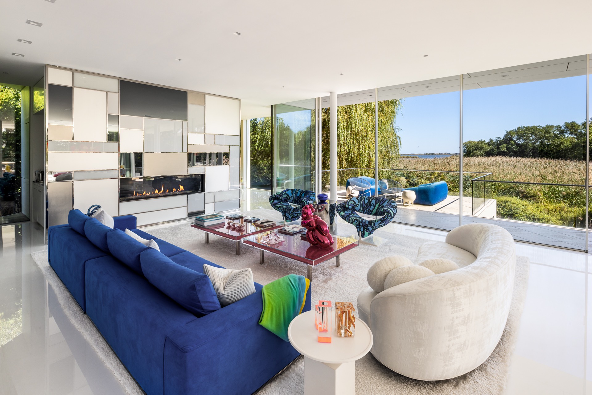34 Cobb Isle Road Water Mill, NY 11976 - Photo 13 of 37 a living room with furniture and a large window