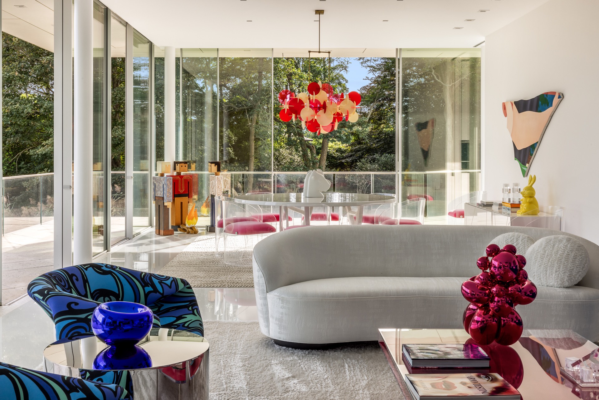 34 Cobb Isle Road Water Mill, NY 11976 - Photo 15 of 37 a living room with furniture and a floor to ceiling window