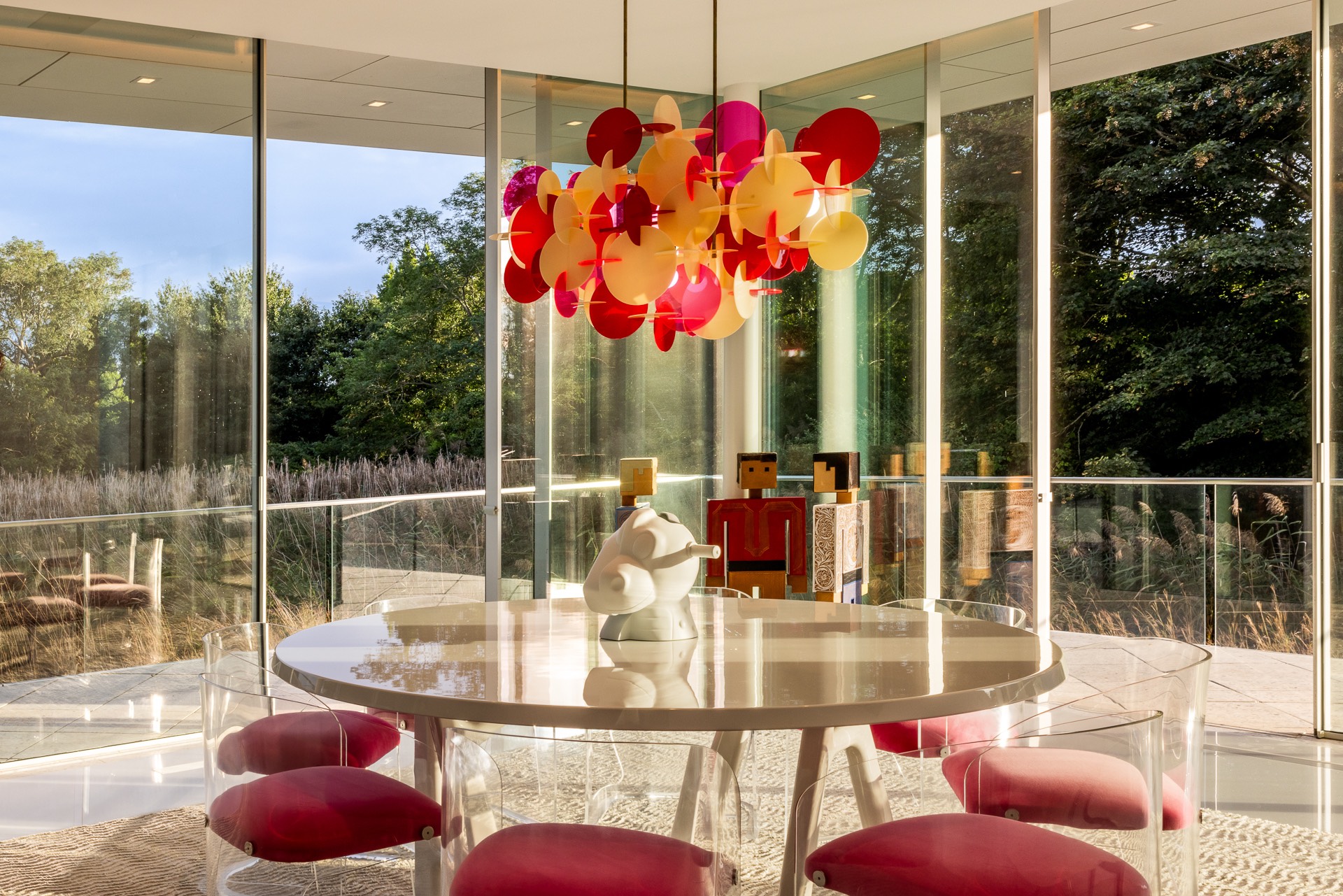 34 Cobb Isle Road Water Mill, NY 11976 - Photo 20 of 37 a view of swimming pool with a dining table and chairs