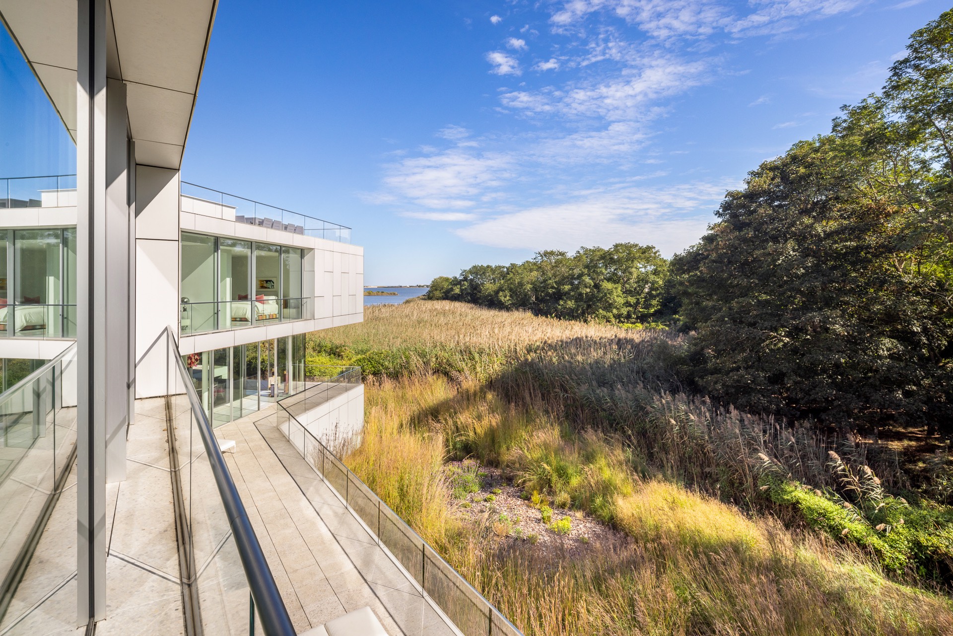 34 Cobb Isle Road Water Mill, NY 11976 - Photo 31 of 37 a view of balcony with hardwood