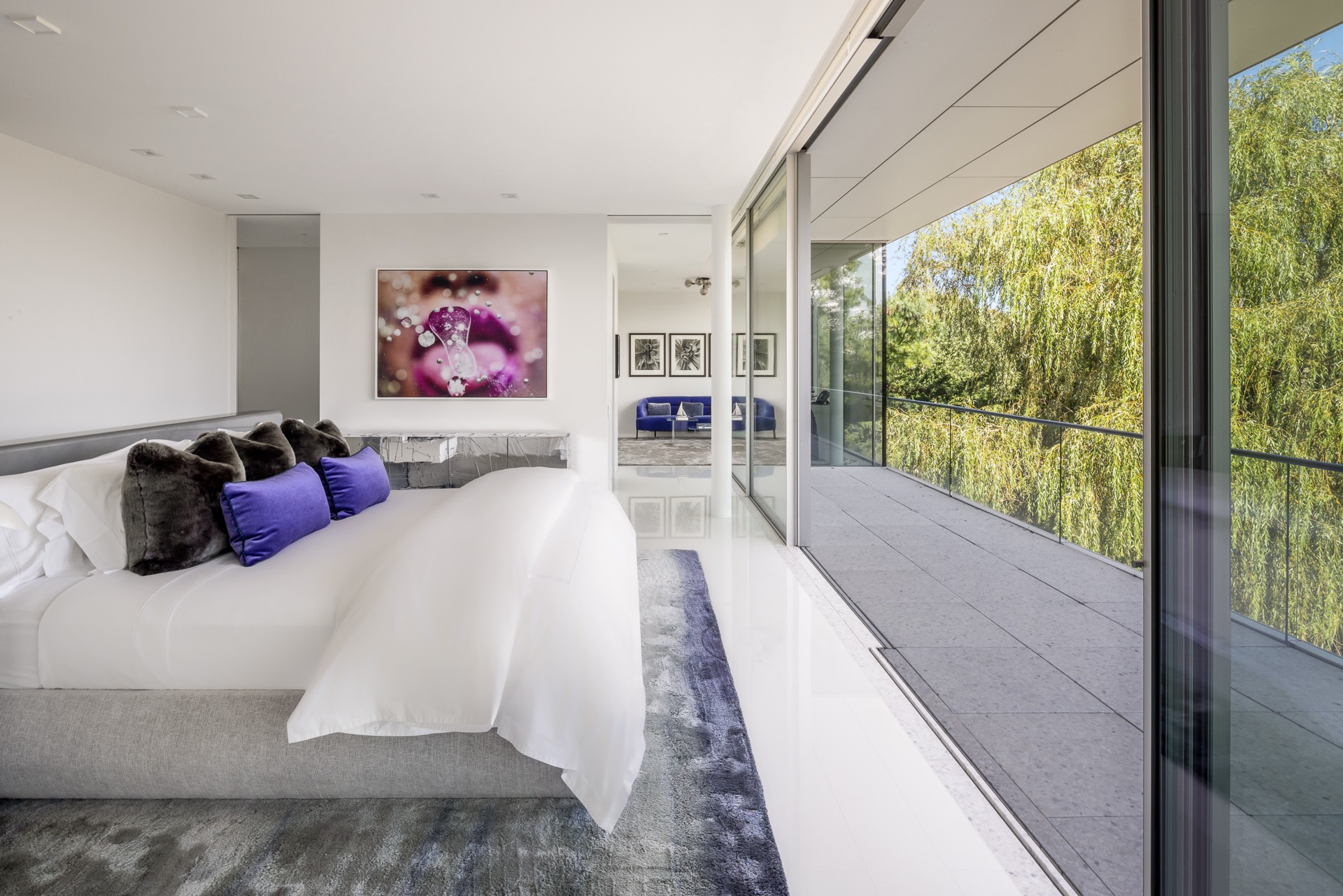 34 Cobb Isle Road Water Mill, NY 11976 - Photo 9 of 37 a bed sitting in a bedroom next to a window