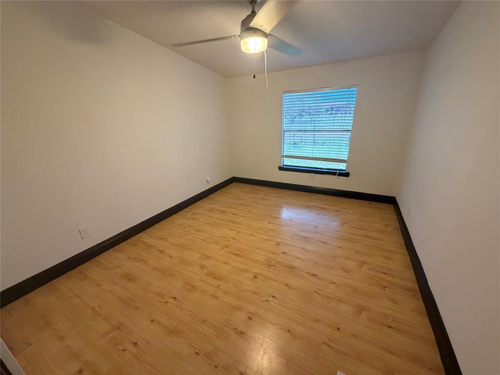 222 Hix Road Cleburne, TX 76031 - Photo 15 of 27 an empty room with windows