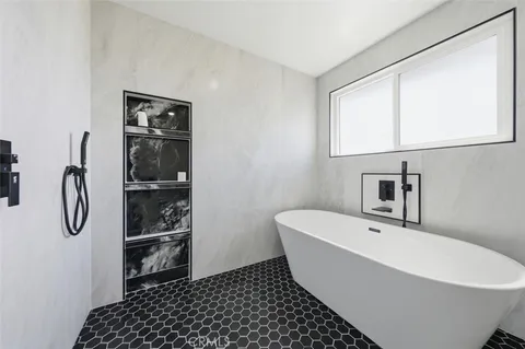 a bathroom with a bathtub