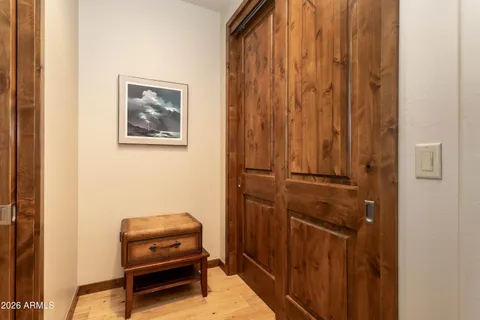 a room with a bed and a chair