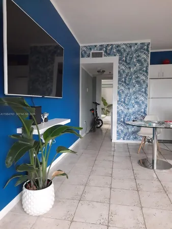 a vase of flowers sitting on a table