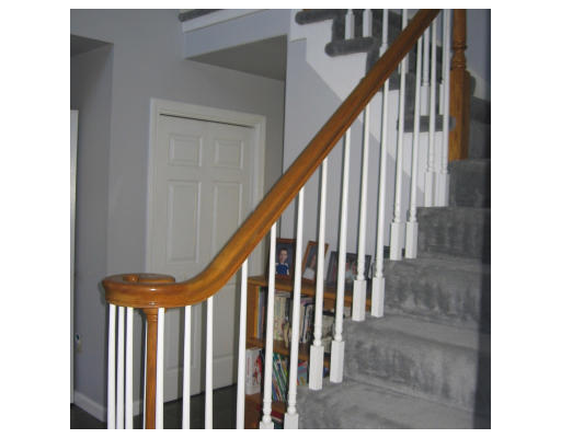1 Robbins Road Ayer, MA 01432 - Photo 4 of 15 a view of staircase with railing and white walls