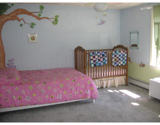 1 Robbins Road Ayer, MA 01432 - Photo 7 of 15 a bedroom with a bed and a window