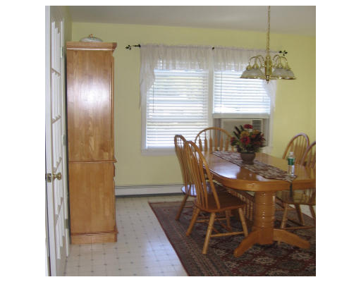 1 Robbins Road Ayer, MA 01432 - Photo 10 of 15 a view of a dining room with furniture