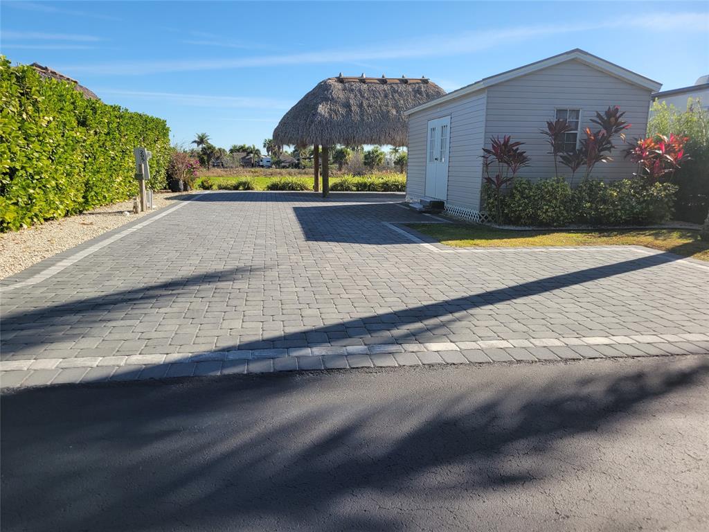 3704 Southwest 7th Manor Okeechobee, FL 34974 - Photo 1 of 13 a view of a house with a yard