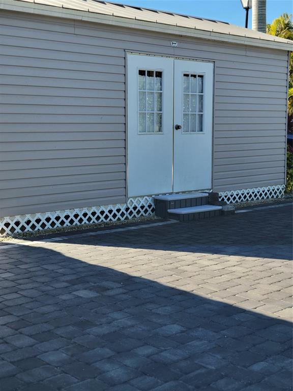 3704 Southwest 7th Manor Okeechobee, FL 34974 - Photo 11 of 13 a view of a terrace with wooden floor