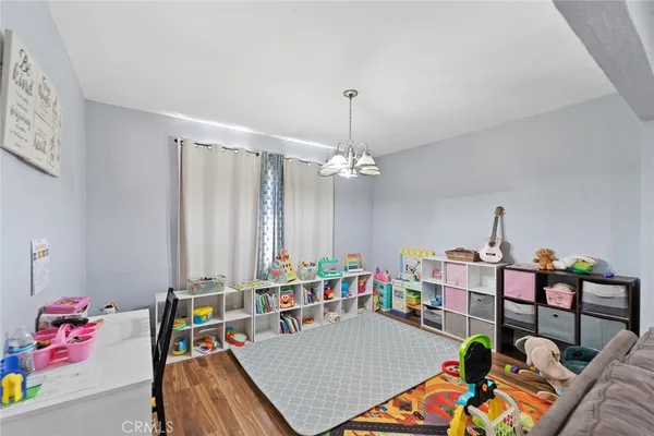 a living room with furniture and a table