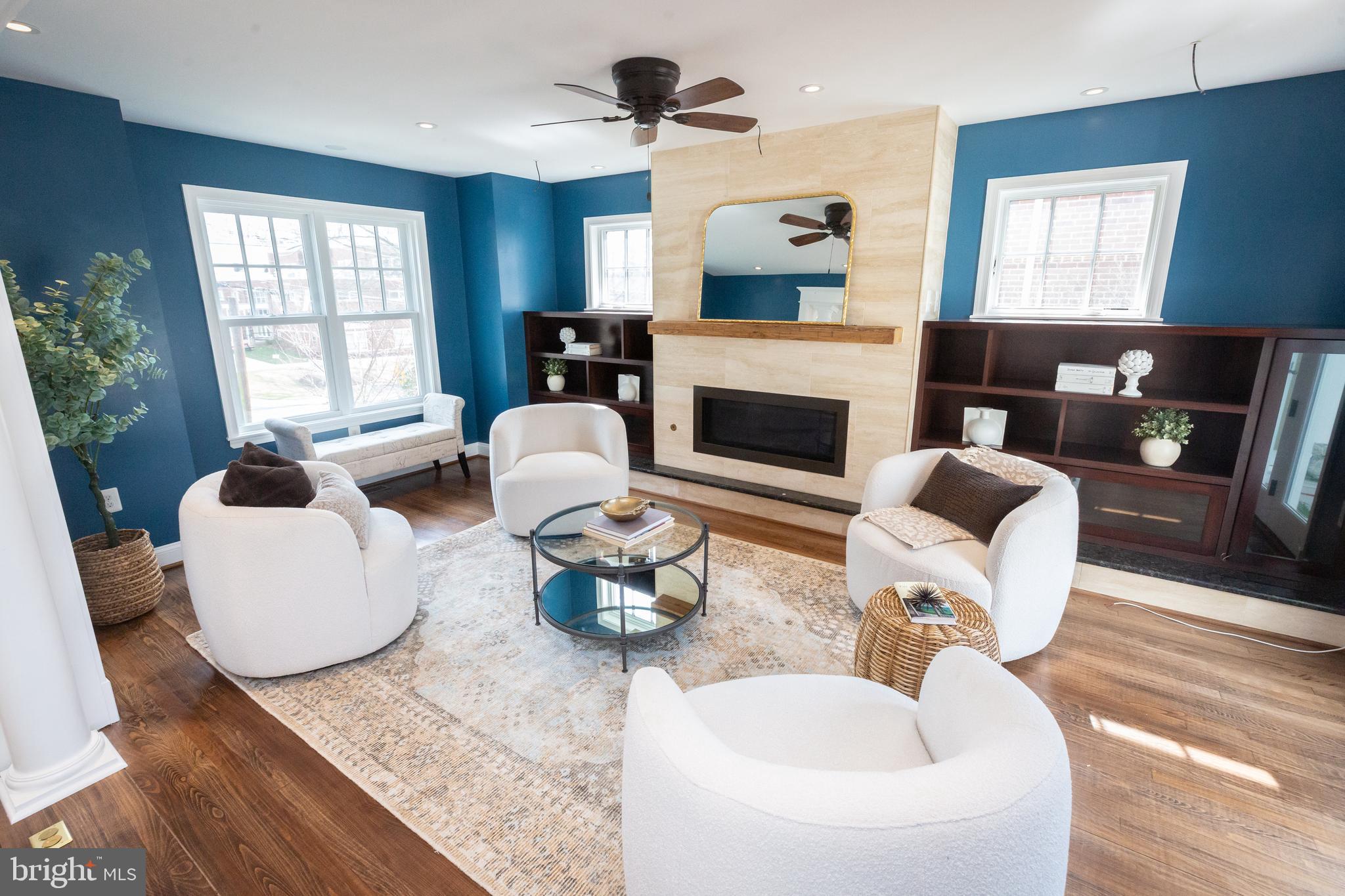 1213 Forest Glen Road Silver Spring, MD 20901 - Photo 12 of 57 a living room with furniture fireplace and window