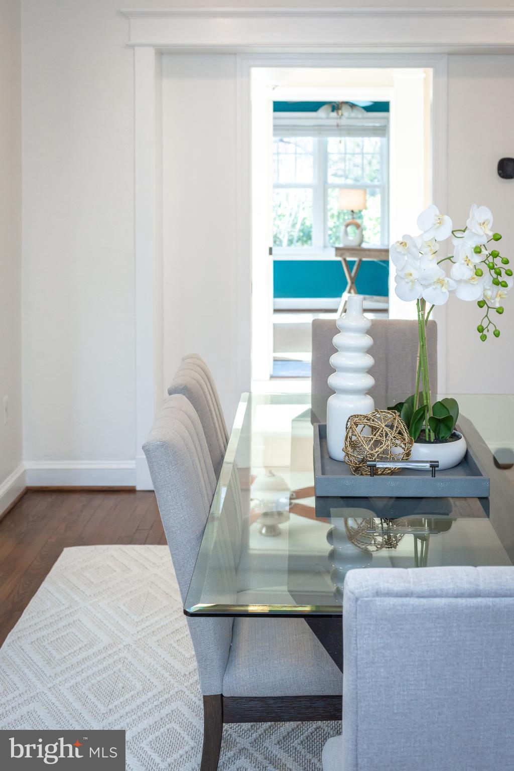 1213 Forest Glen Road Silver Spring, MD 20901 - Photo 14 of 57 a living room with furniture and a potted plant