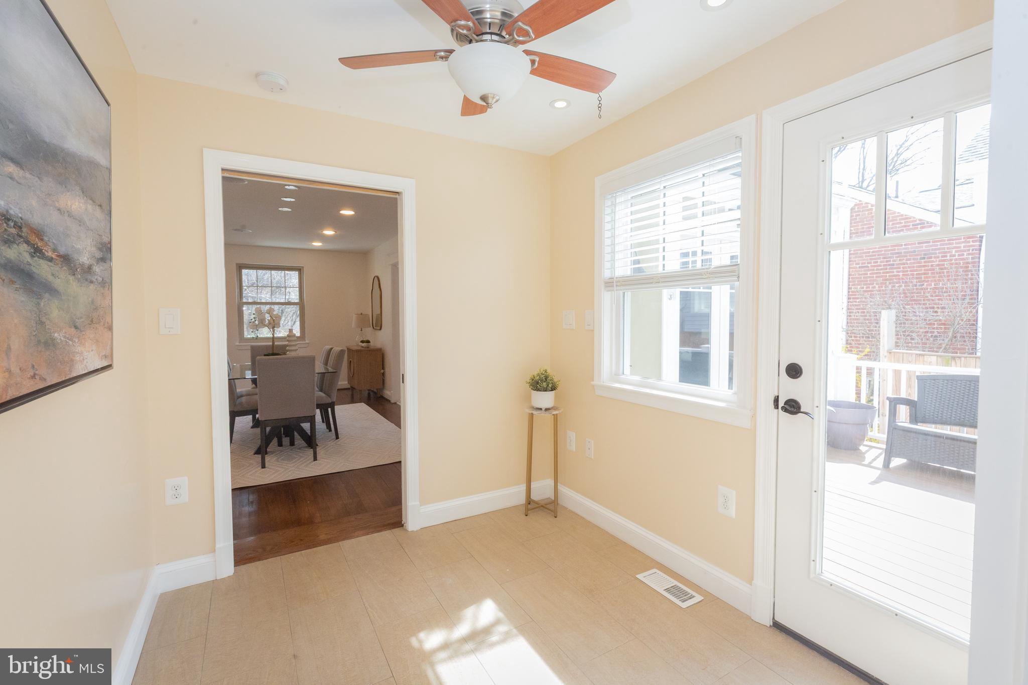 1213 Forest Glen Road Silver Spring, MD 20901 - Photo 15 of 57 a living room with furniture and a large window