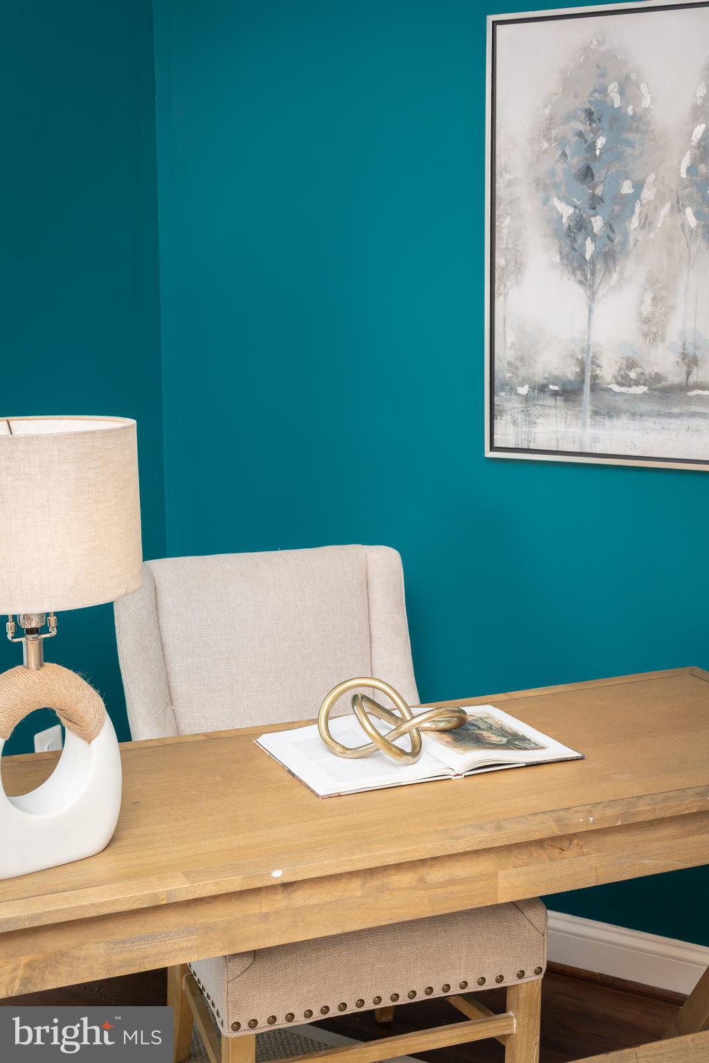 1213 Forest Glen Road Silver Spring, MD 20901 - Photo 18 of 57 a laptop computer sitting on top of a wooden table
