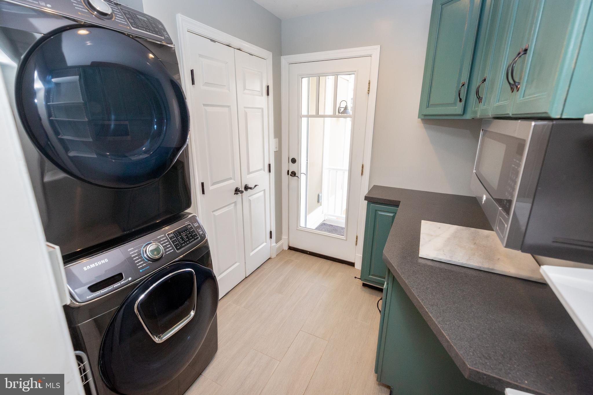 1213 Forest Glen Road Silver Spring, MD 20901 - Photo 27 of 57 a utility room with dryer and washer