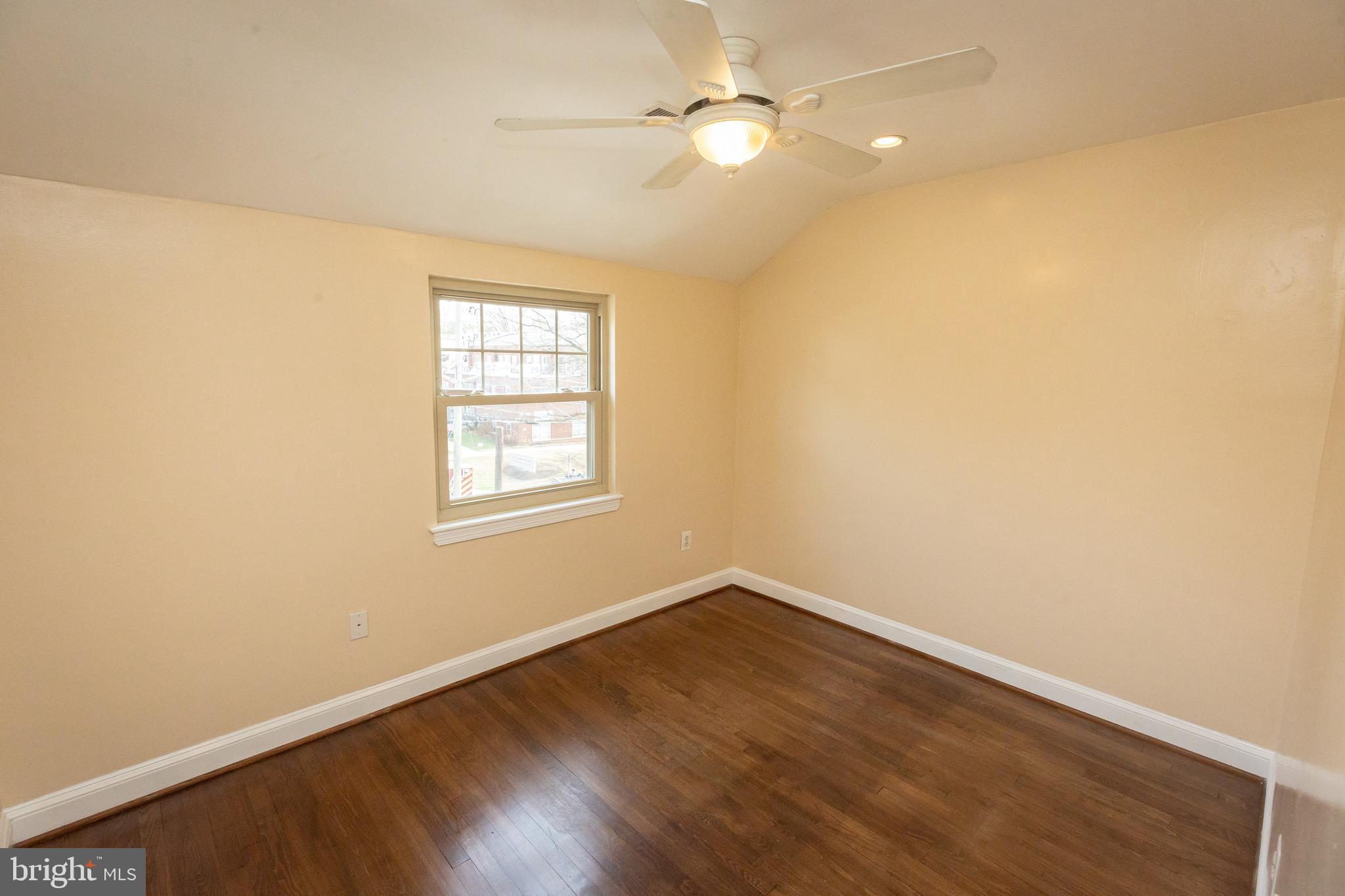 1213 Forest Glen Road Silver Spring, MD 20901 - Photo 36 of 57 wooden floor in an empty room with a window