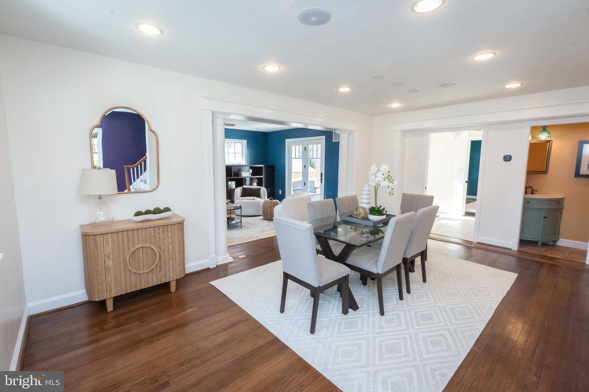 1213 Forest Glen Road Silver Spring, MD 20901 - Photo 4 of 57 a view of a dining room with furniture and wooden floor