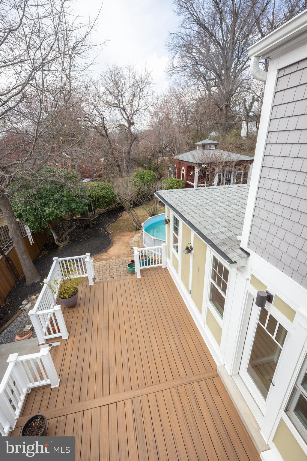 1213 Forest Glen Road Silver Spring, MD 20901 - Photo 46 of 57 a view of balcony with wooden floor and outdoor seating