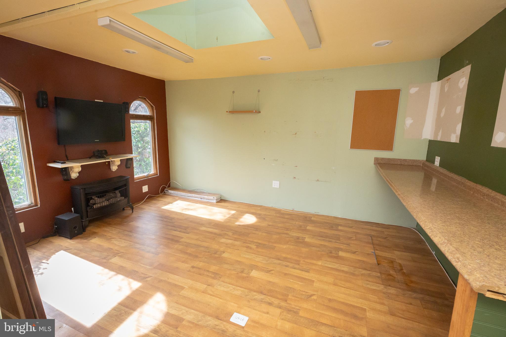 1213 Forest Glen Road Silver Spring, MD 20901 - Photo 49 of 57 a view of a livingroom with furniture and a flat screen tv