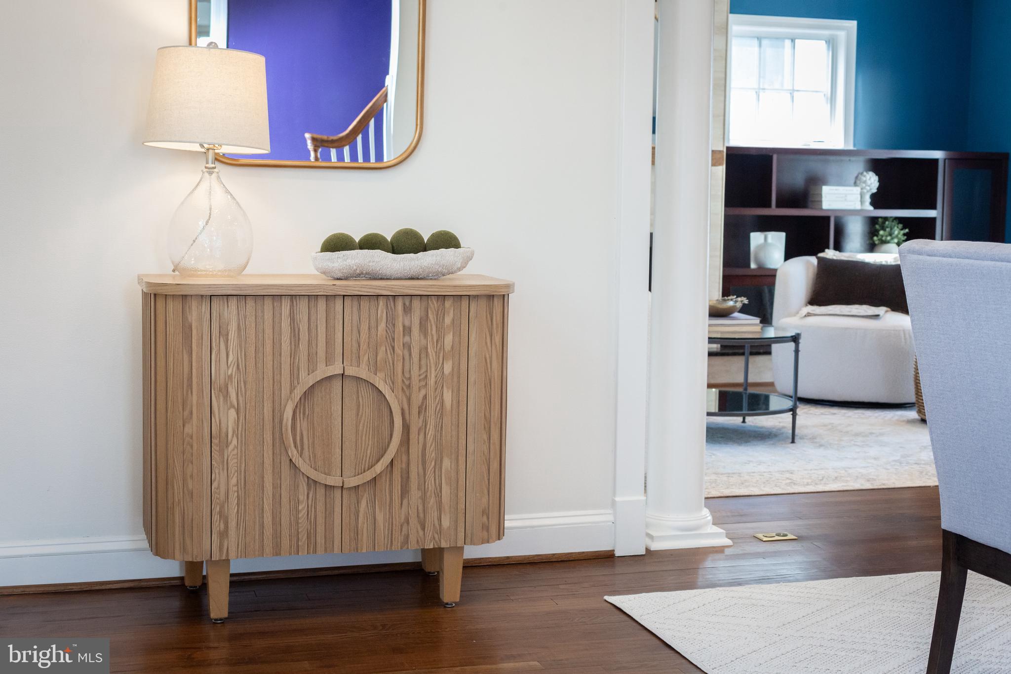 1213 Forest Glen Road Silver Spring, MD 20901 - Photo 5 of 57 a view of living room with furniture and wooden floor