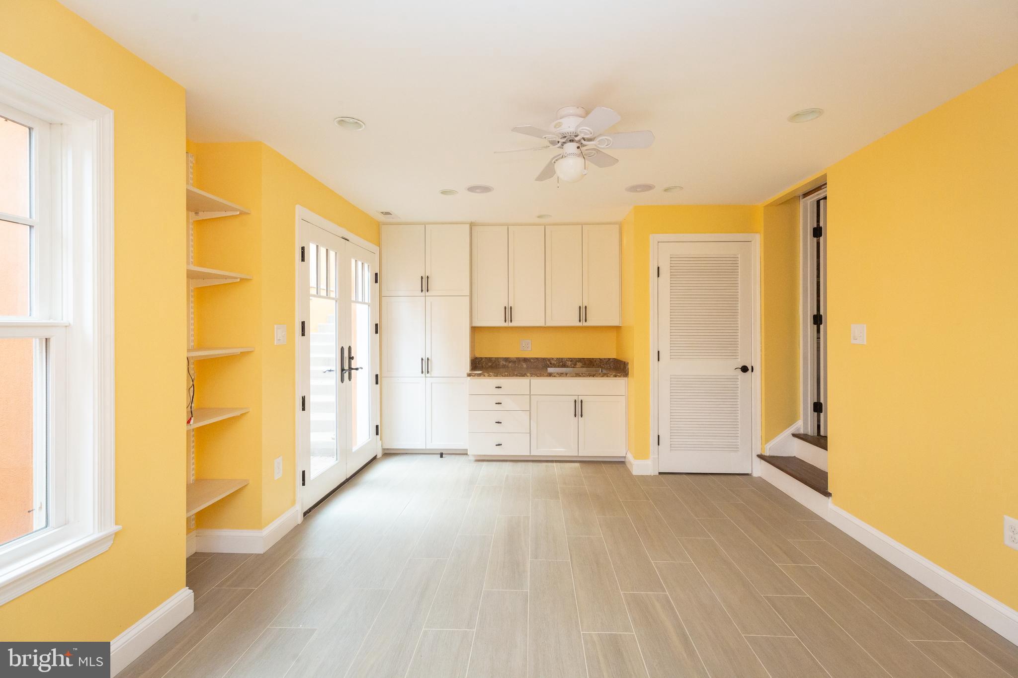 1213 Forest Glen Road Silver Spring, MD 20901 - Photo 51 of 57 a view of a kitchen with a sink and a cabinet