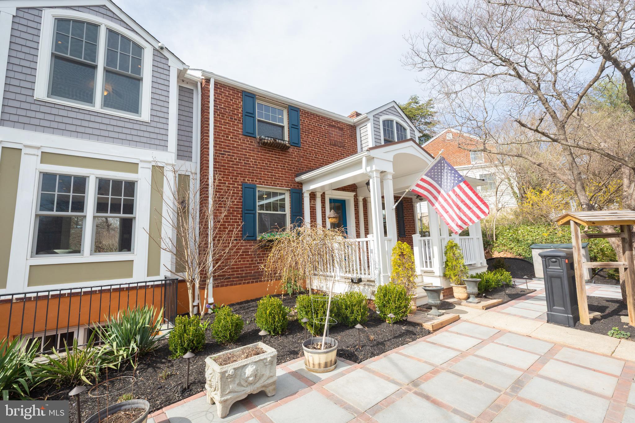 1213 Forest Glen Road Silver Spring, MD 20901 - Photo 52 of 57 a front view of a house with a yard