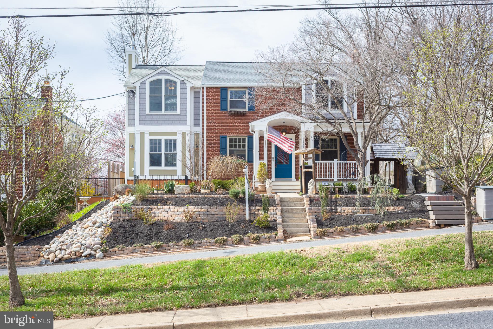1213 Forest Glen Road Silver Spring, MD 20901 - Photo 53 of 57 a front view of a house with a yard