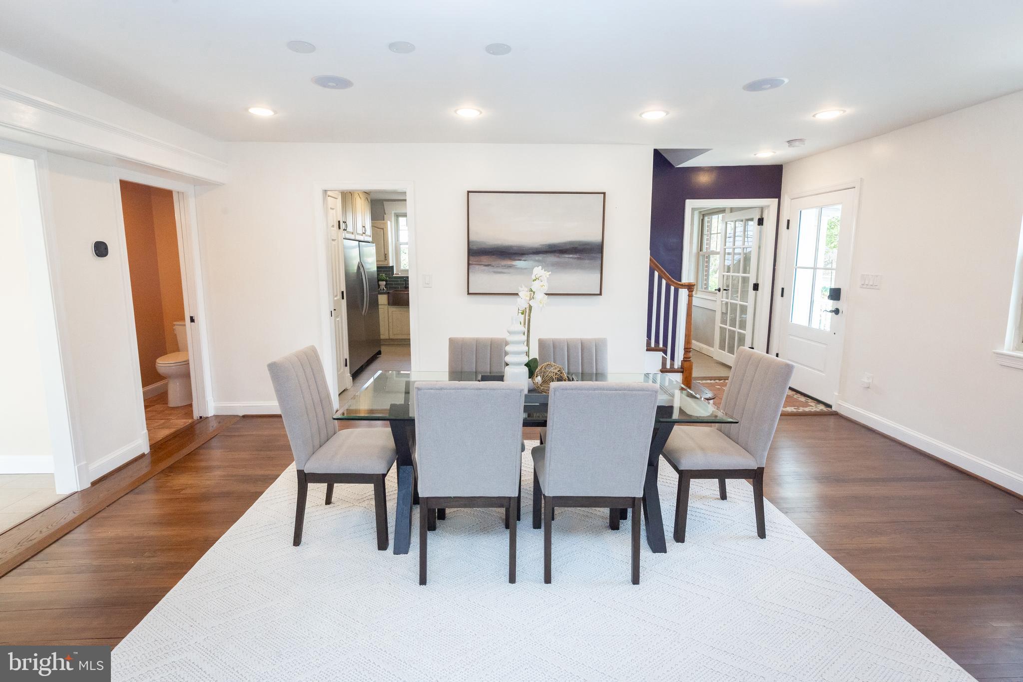 1213 Forest Glen Road Silver Spring, MD 20901 - Photo 7 of 57 a view of a dining room with furniture and wooden floor