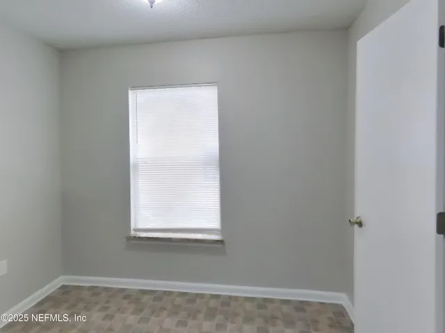 a view of a small space with a window