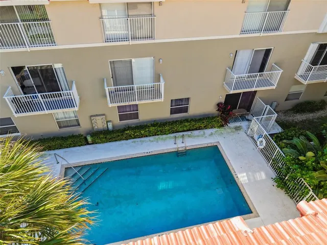 a view of a bathroom from the hallway