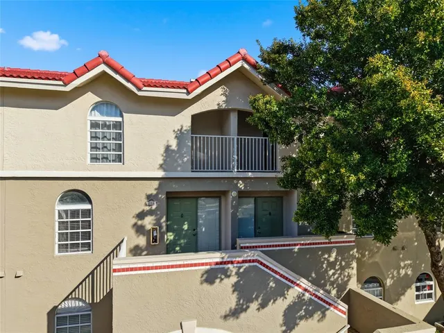 a house view with a swimming pool