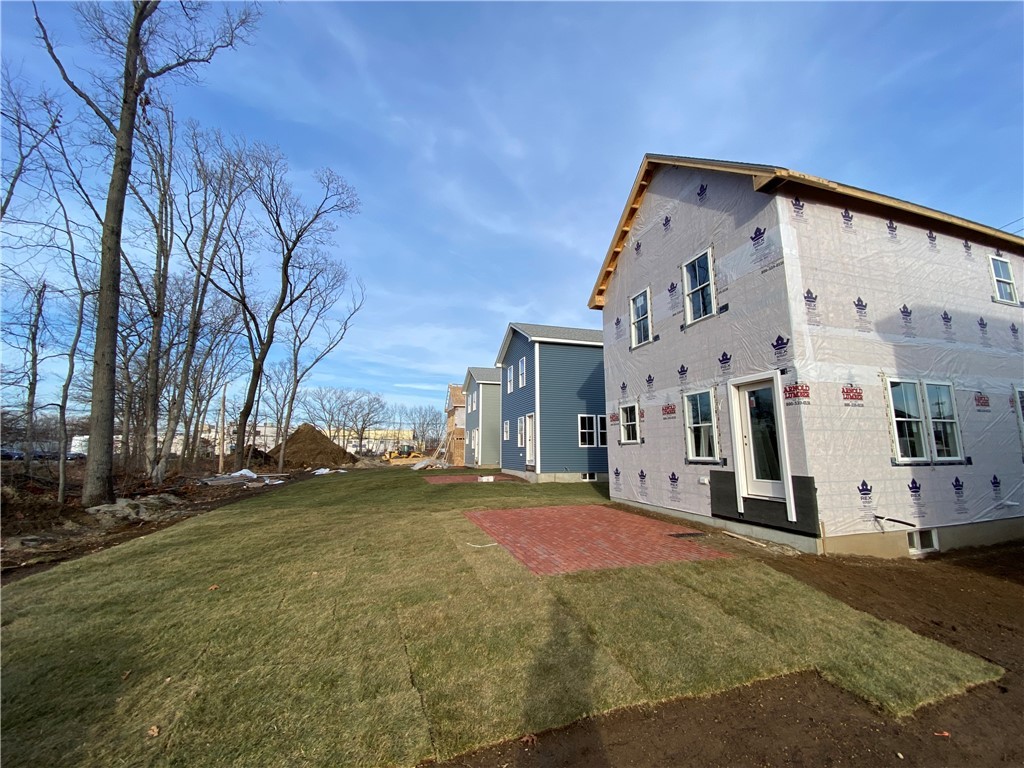 145 Graystone Street Warwick, RI 02886 - Photo 14 of 23 Rear View, Brick patios