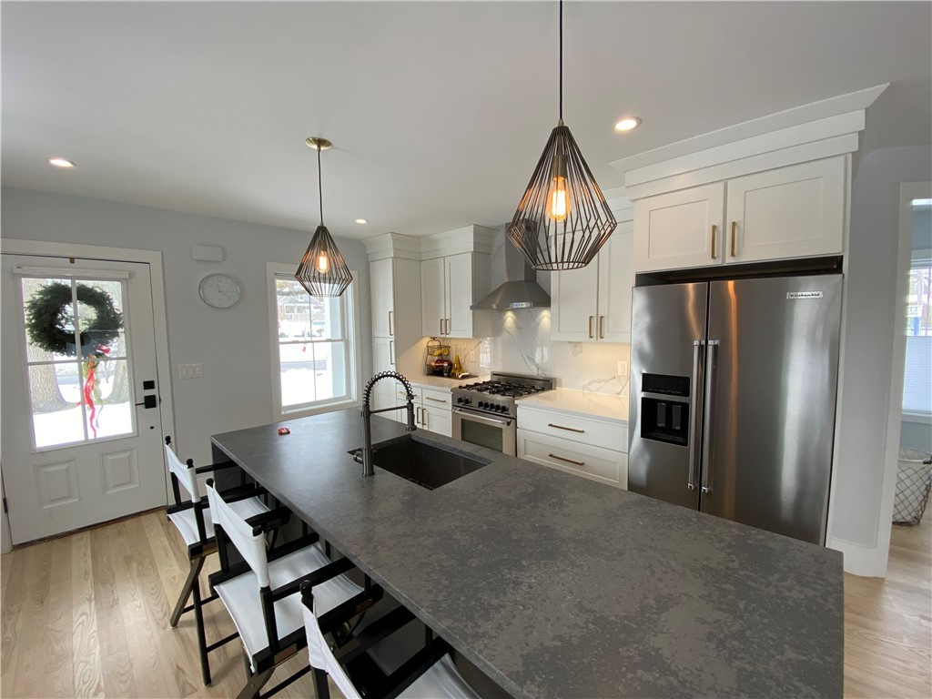 145 Graystone Street Warwick, RI 02886 - Photo 6 of 23 Previously constructed home with similar kitchen layout. Finishes and appliances may differ