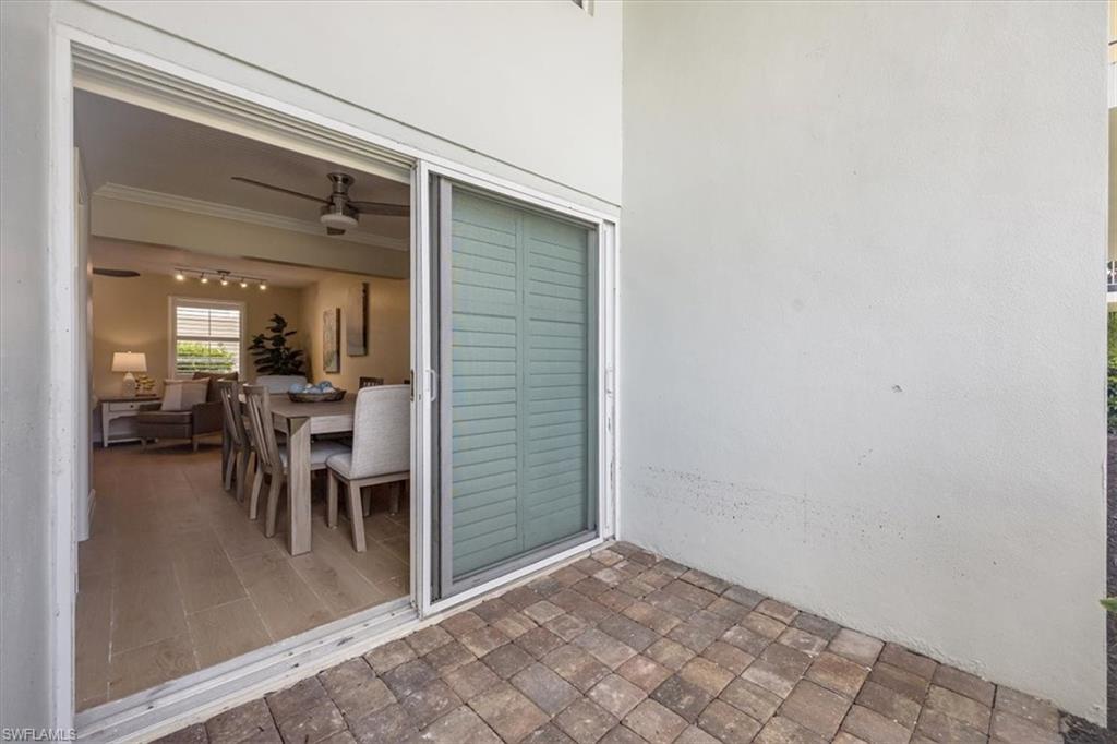 626 12th Avenue South, Unit 626 Naples, FL 34102 - Photo 33 of 50 a view of a dining room with furniture